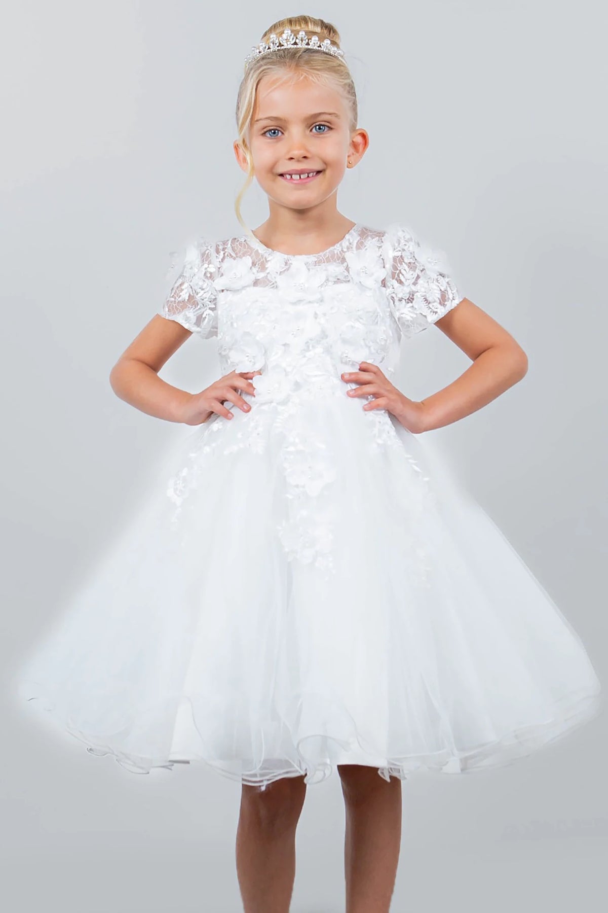 A white lace flower girl dress.