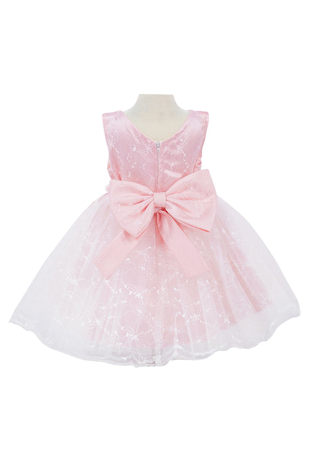 Pink flower girl dress back view highlighting voluminous tulle skirt and elegant silhouette.