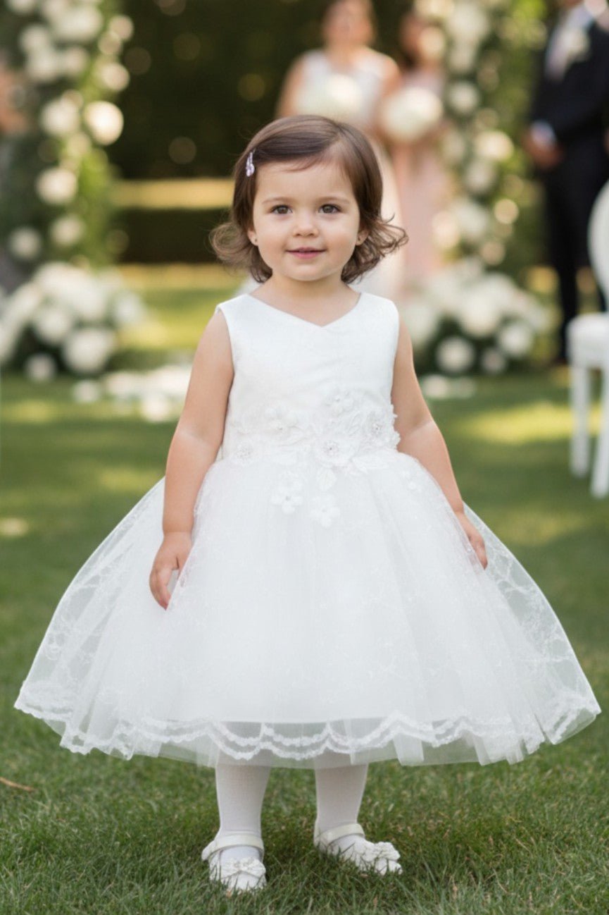 White flower girl Dress Front View With Embroidered Bodice And Layered Tulle Skirt.