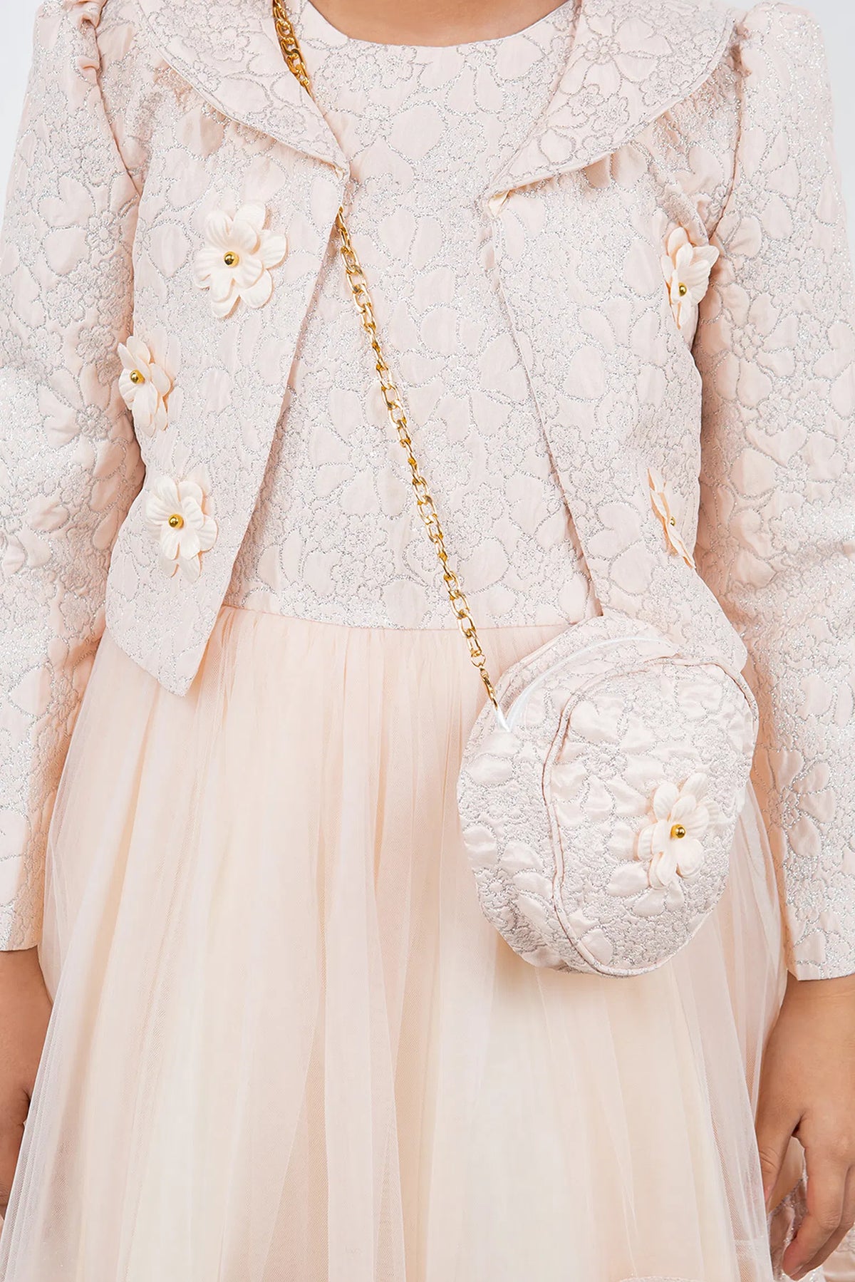 Detailed by a cropped matching jacket, the Pink kids party dress reveals its construction.