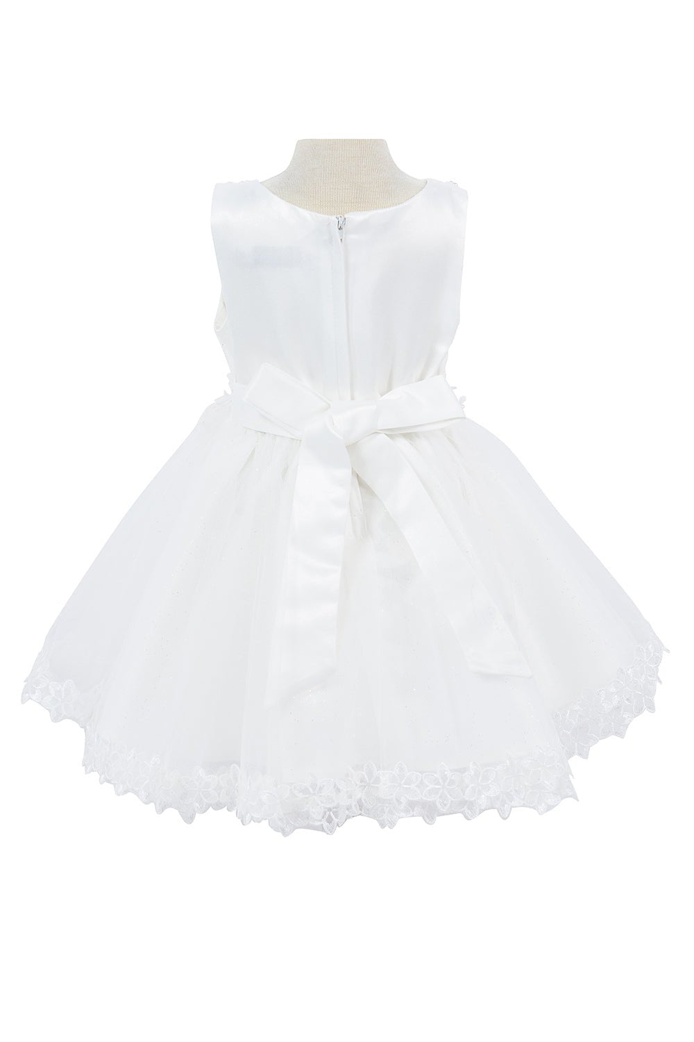 White flower girl dress back view highlighting voluminous tulle skirt and elegant silhouette.