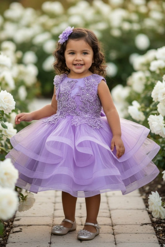 Kid Wearing Lilac Flower Girl Dress Front View With Embroidered Bodice And Layered Tulle Skirt