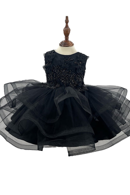 Full-length view highlights Black flower girl dress with black BabyToddler Butterfly Pearl Multi-layered Tulle 1st Birthday Party.