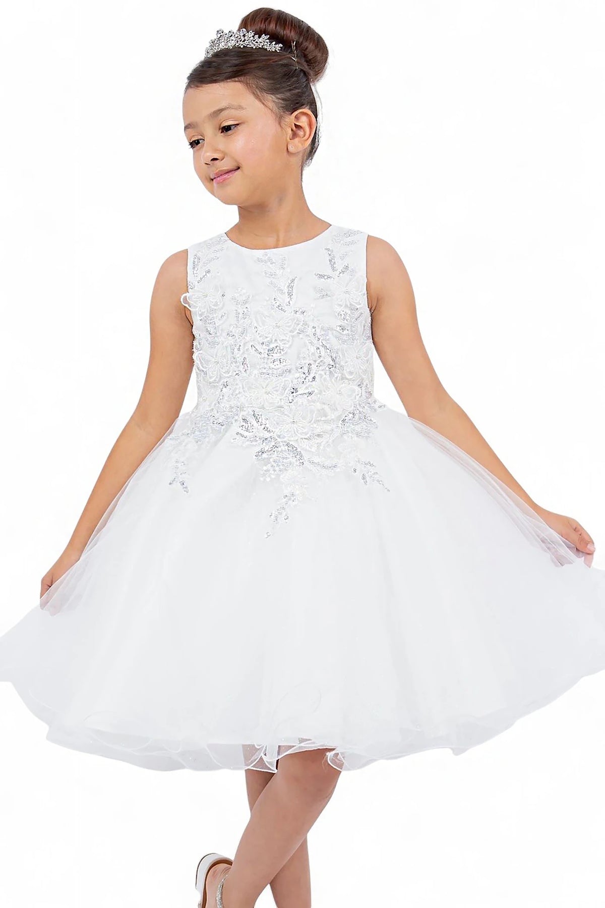 A white lace flower girl dress.