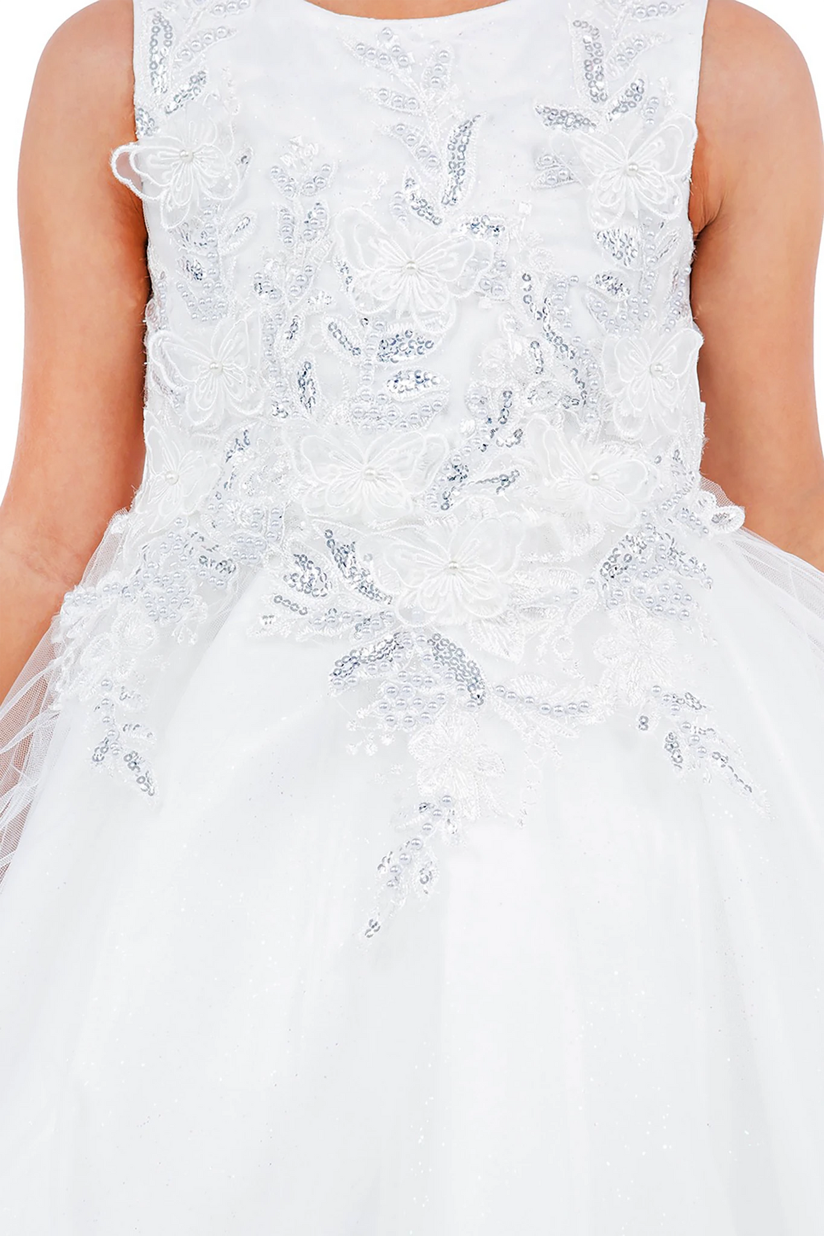 White lace flower girl dress with a close-up of the intricate detailing.