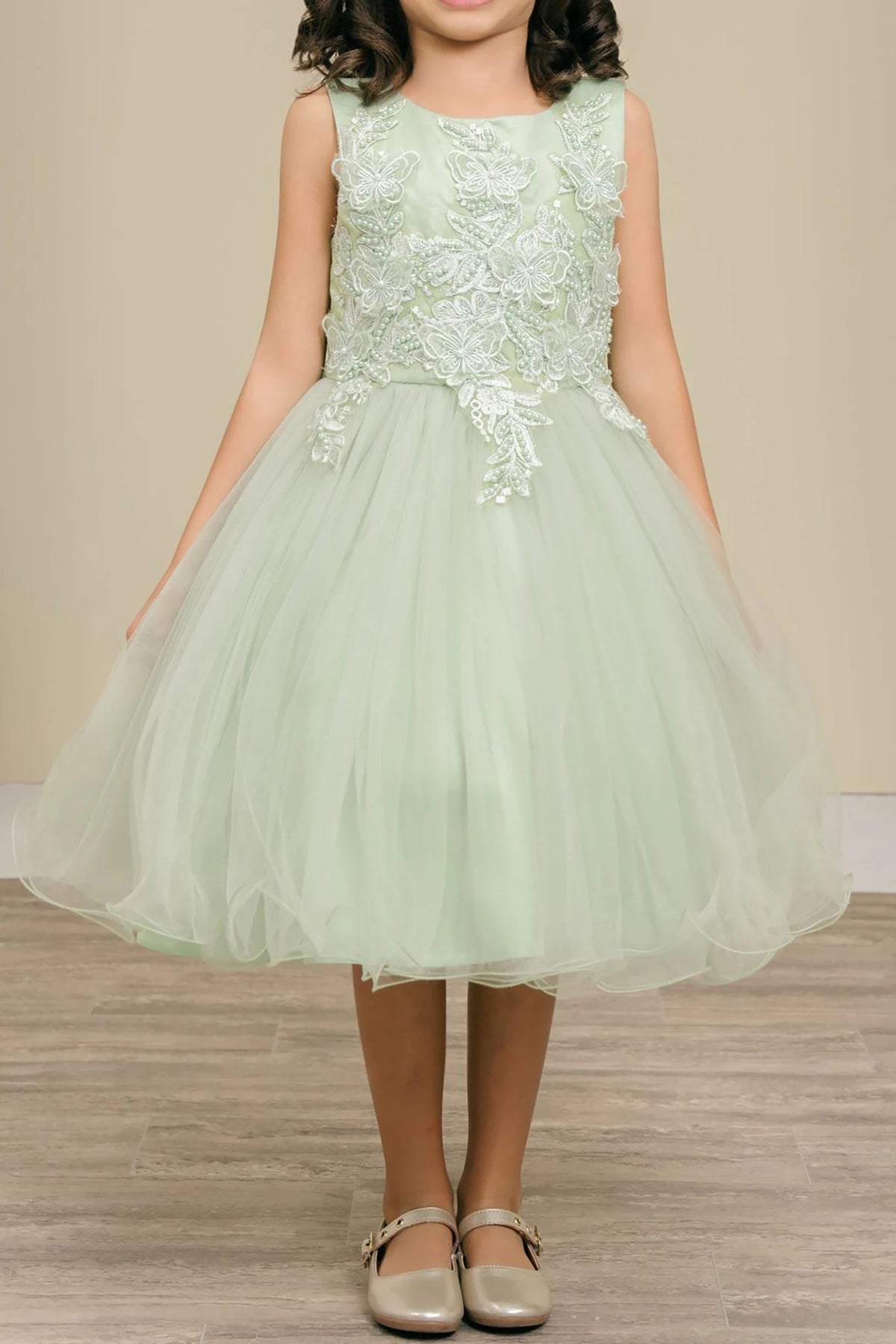 Sage flower girl dress with floral lace top and tulle skirt.