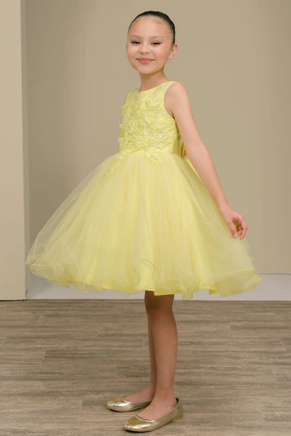 Shown in a front view, the Yellow flower girl dress has sleeveless floral bodice and flared tulle skirt.