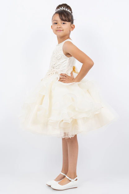 Visible on this Ivory flower girl dress: layered ruffles below the beaded waist.