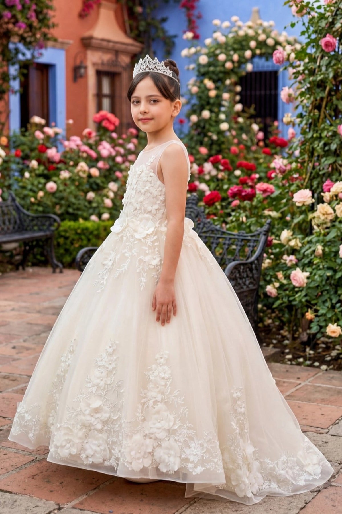 Featuring flower appliques on the bodice and full-length skirt on the Ivory flower girl dress.