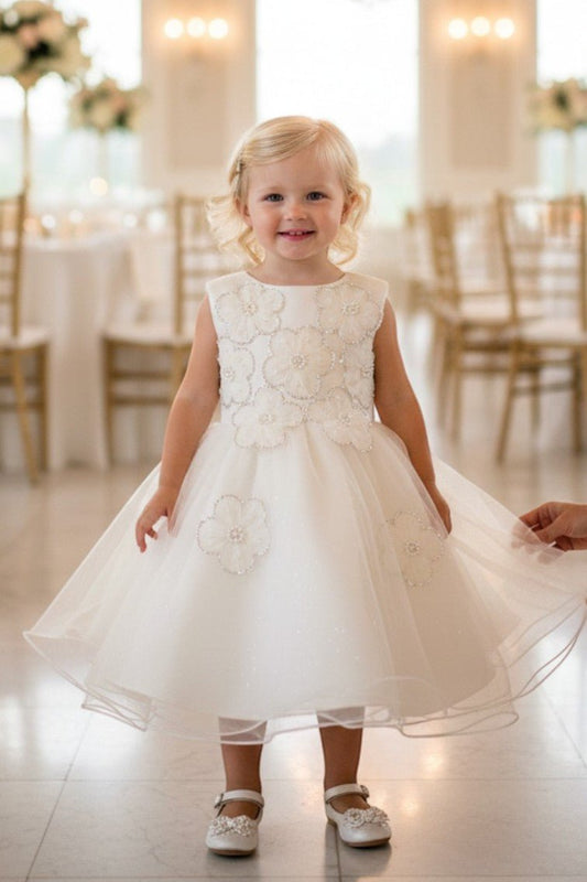Kid Wearing Ivory Flower Girl Dress Front View With Layered Skirt And Oversized Bow Detail