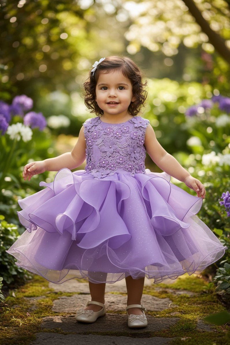 Lilac flower girl Dress Front View With Layered Skirt And Oversized Bow Detail.