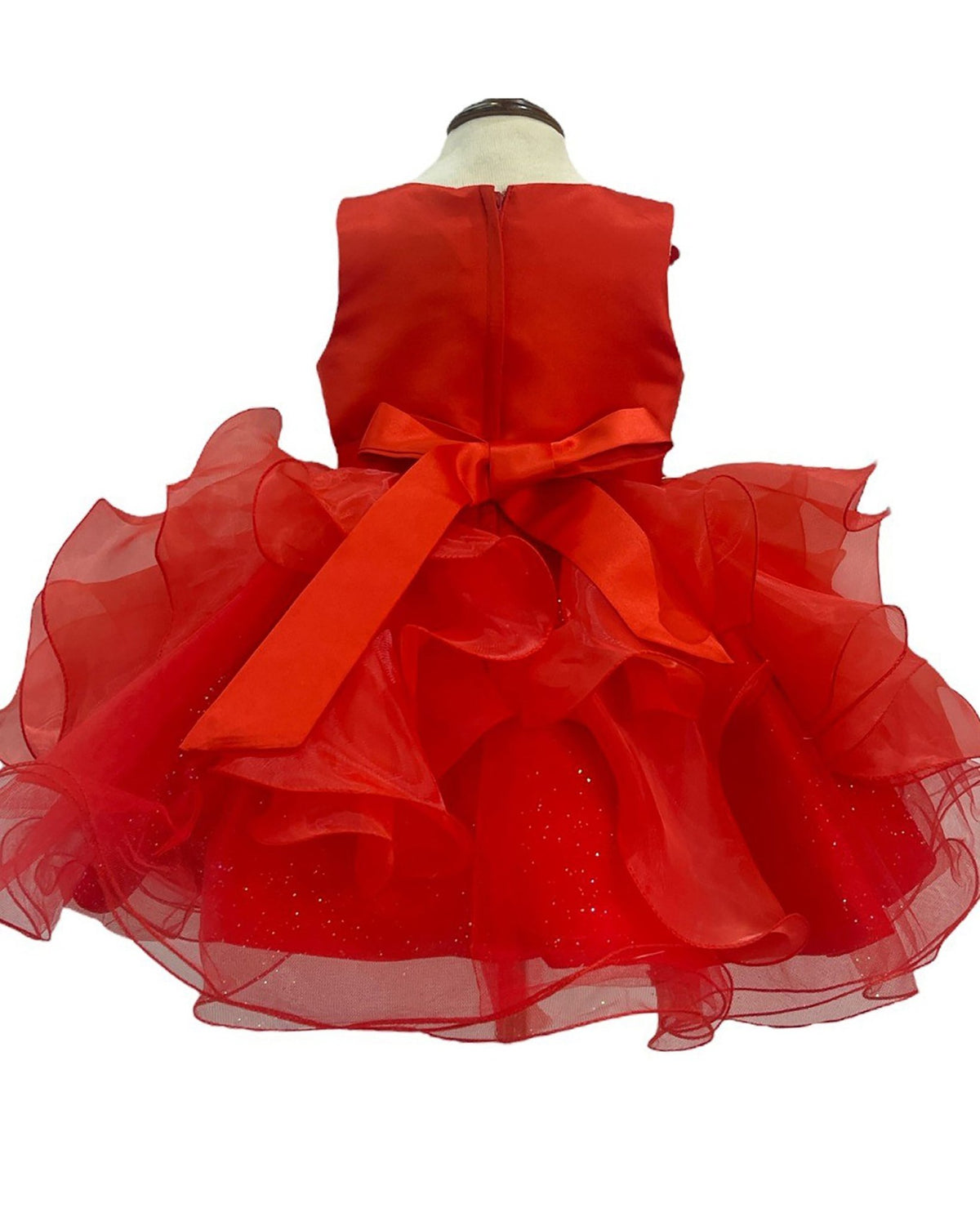 Back-facing in red tulle birthday flower girl dress with lace-up closure, pearl detailing, and sequin floral accents.