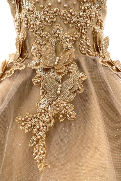 Butterfly appliques and beaded flowers detail the Gold flower girl baby dress at the waist.