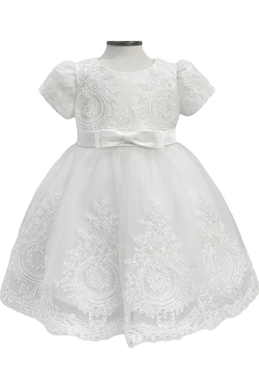 White lace baby dress with puff sleeves on a mannequin with a white background