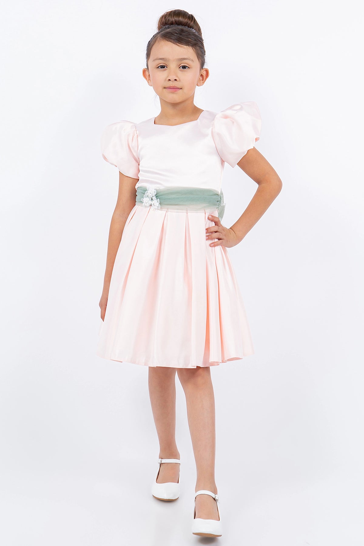 Visible on this Blush flower girl dress: pleated satin skirt beneath the fitted bodice.