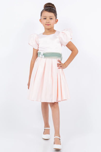 Visible on this Blush flower girl dress: pleated satin skirt beneath the fitted bodice.