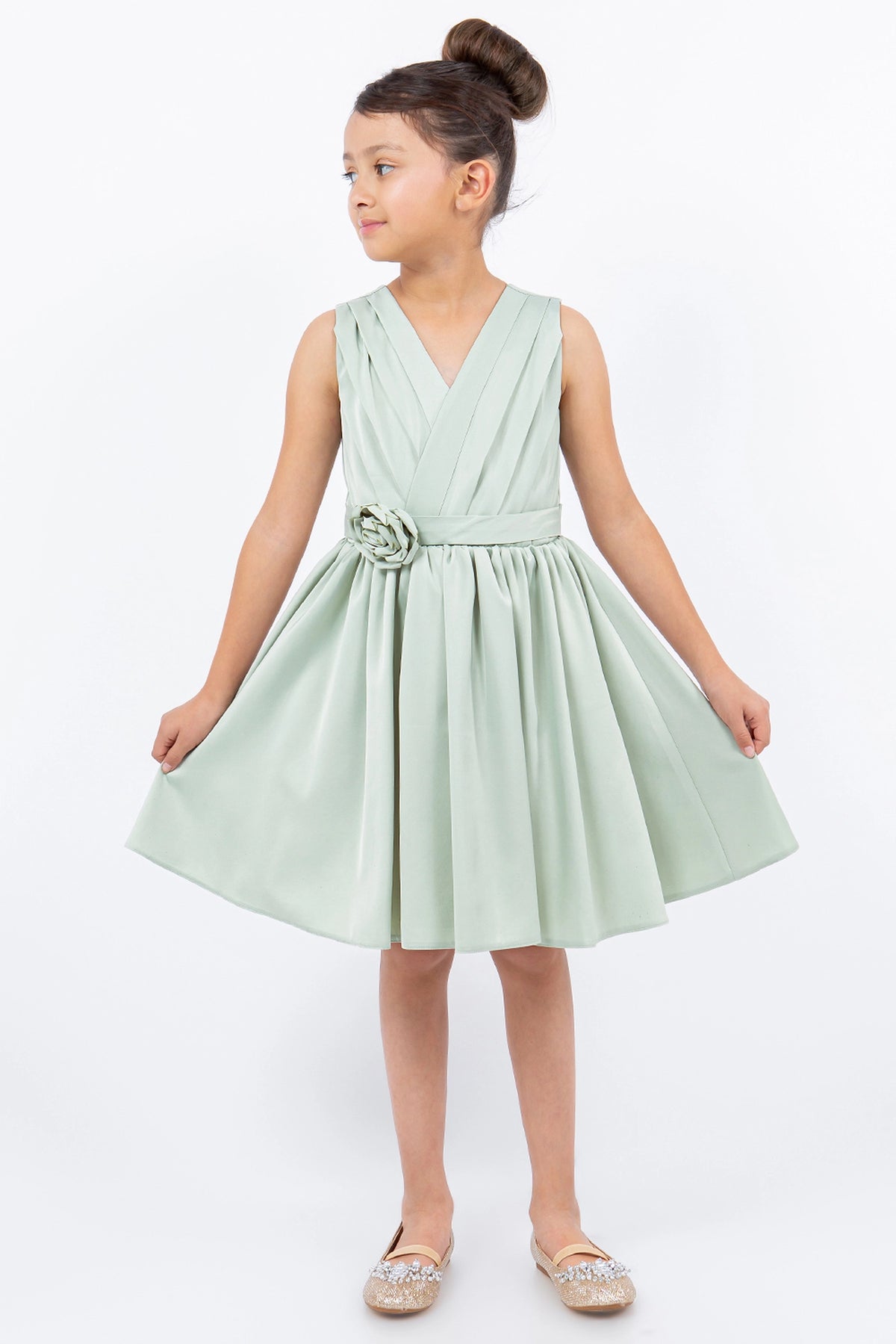 Accented diagonal bodice pleats adds character to this Sage kids party dress.