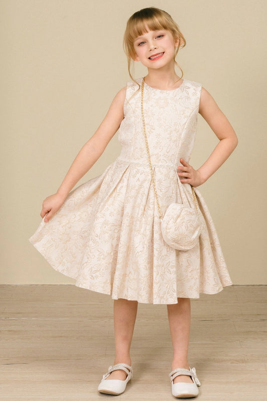 Showcasing with floral jacquard texture, this Champagne kids party dress displays elegant detail.