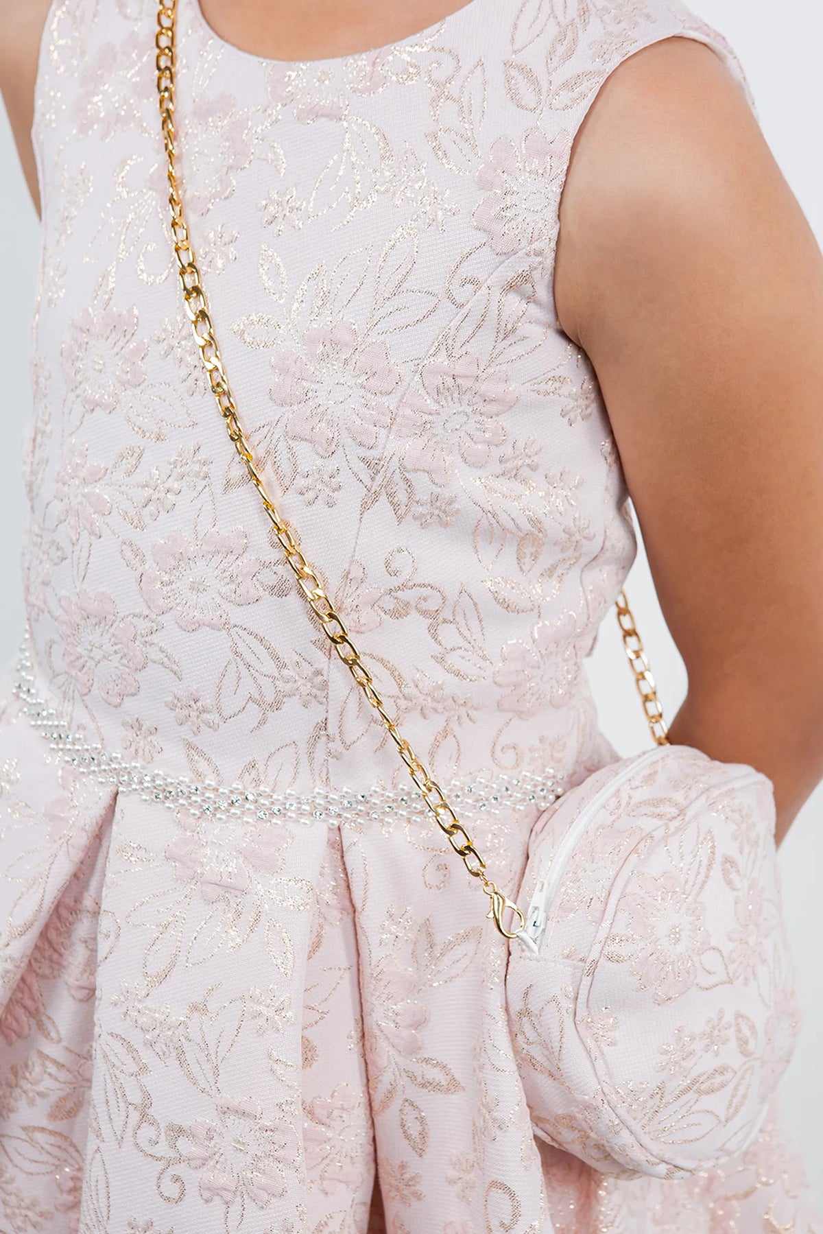 Detailed by floral jacquard texture, the Pink kids party dress reveals its construction.