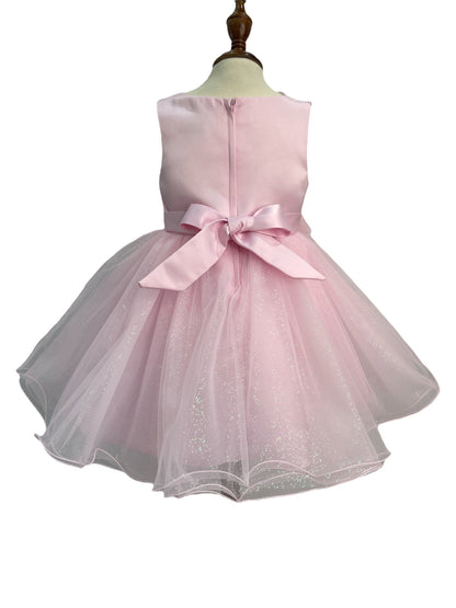 Pink dress back view highlighting full skirt and elegant silhouette