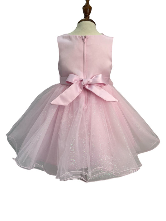 Pink dress back view highlighting full skirt and elegant silhouette