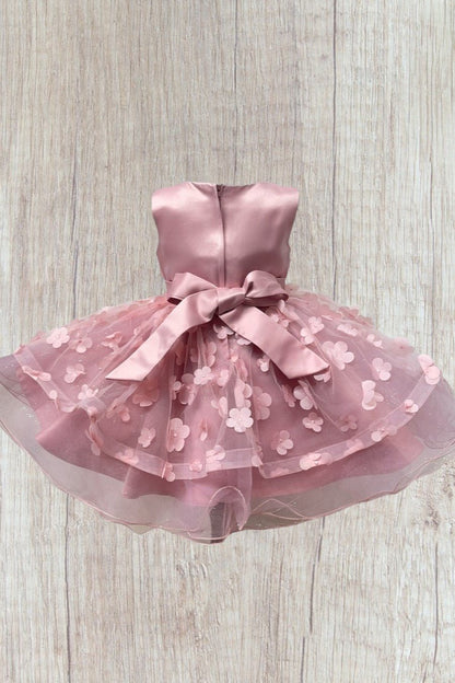 Dusty rose dress back view highlighting elegant fit and classic silhouette