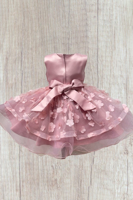 Dusty rose dress back view highlighting elegant fit and classic silhouette