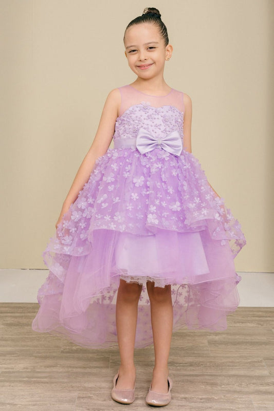 Kid wearing Lilac flower girl dress front view with illusion bodice and hi-low 3D flower skirt