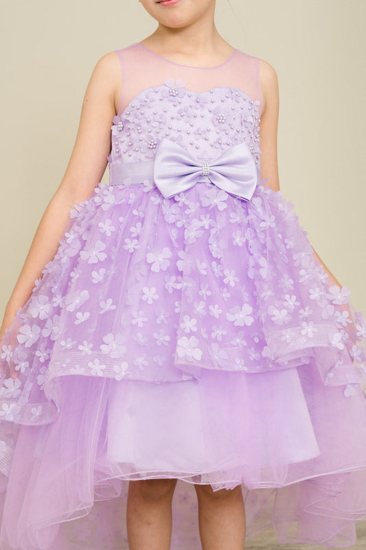 Close-up front view of lilac dress showing 3D floral detail and bodice texture
