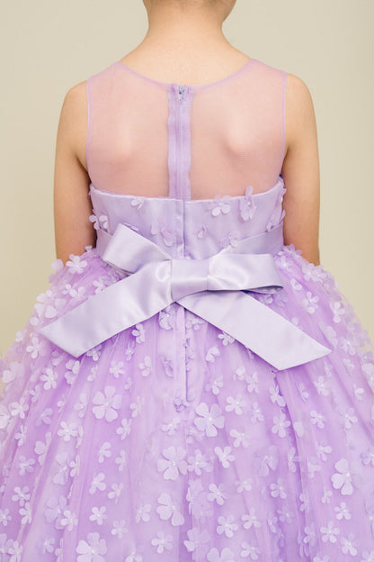 Close-up back view of lilac dress showing 3D floral detail and bodice texture