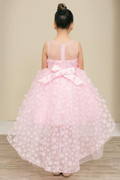 Back view of Little girl wearing pink dress at formal event posing confidently
