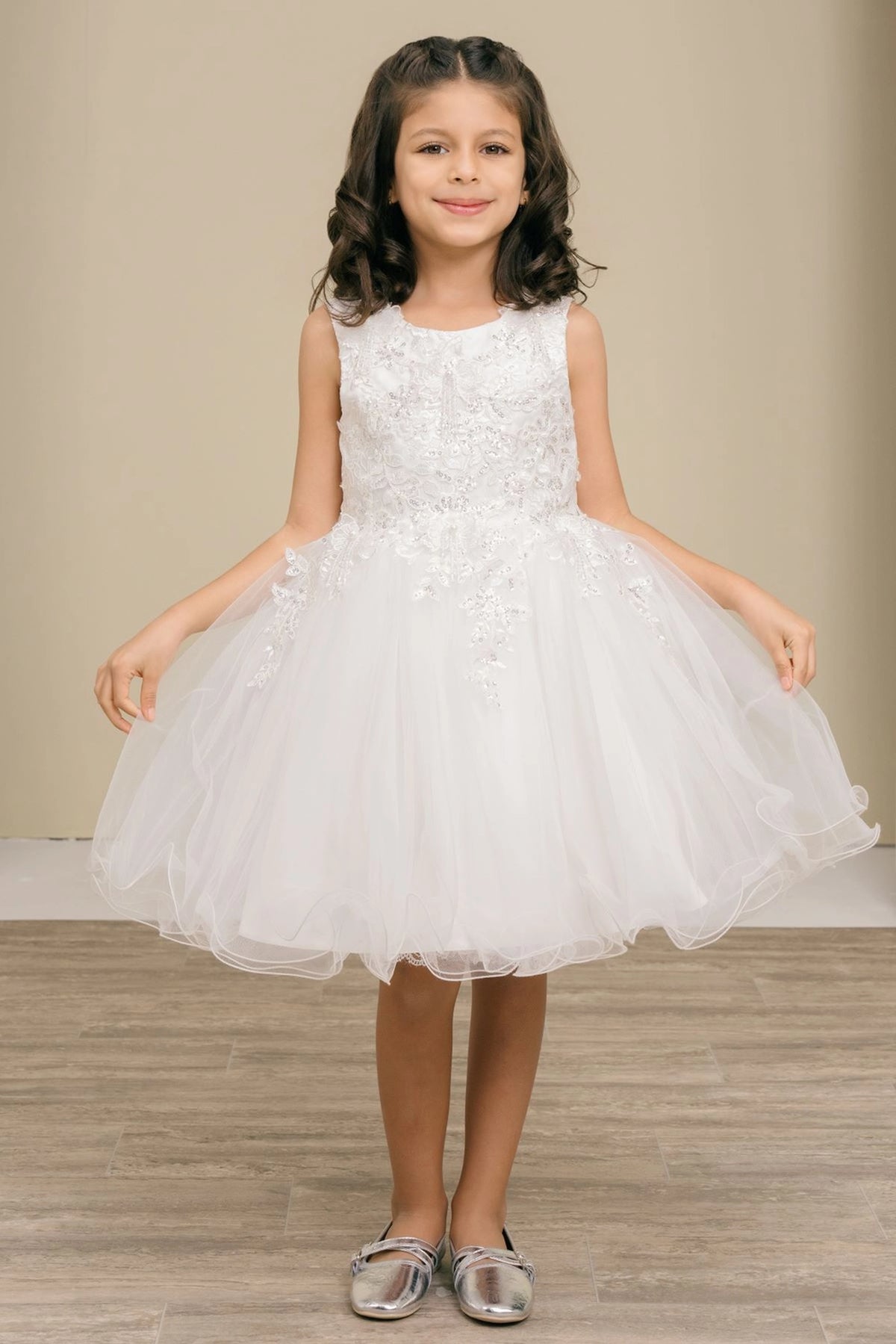 Showcasing with floral lace across the bodice, this Off-White kids party dress displays elegant detail.