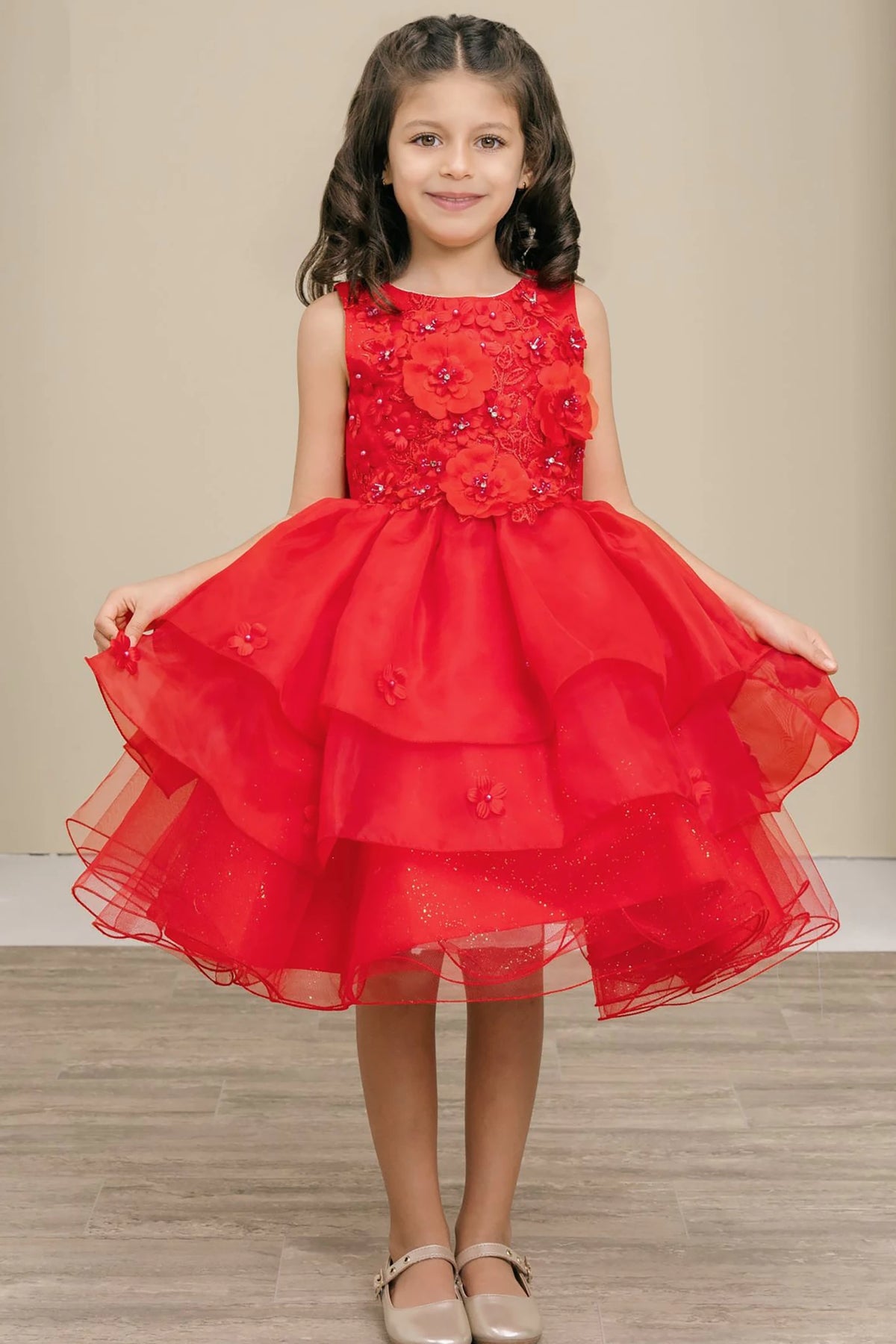 A red flower girl dress with floral details.