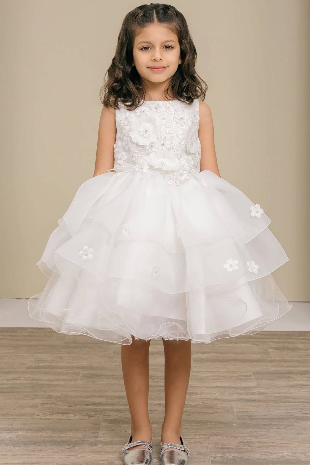 A white floral flower girl dress.