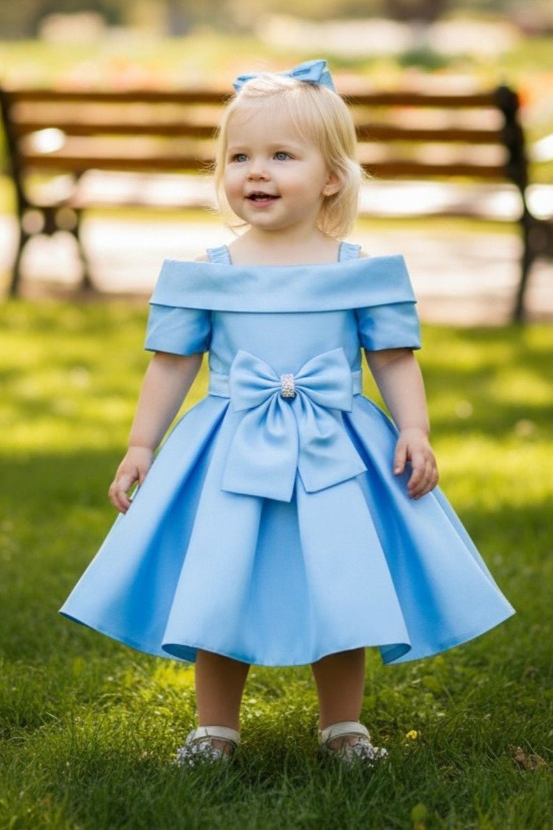 Kid Wearing Blue Flower Girl Dress Front View With Off Shoulder Neckline And Bow Waist
