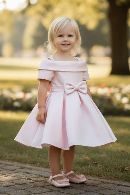 Kid Wearing Blush Flower Girl Dress Front View With Off Shoulder Neckline And Bow Waist