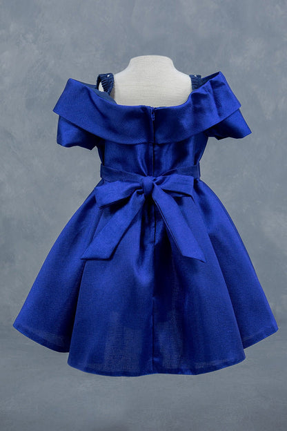 Blue dress back view highlighting elegant fit and classic silhouette