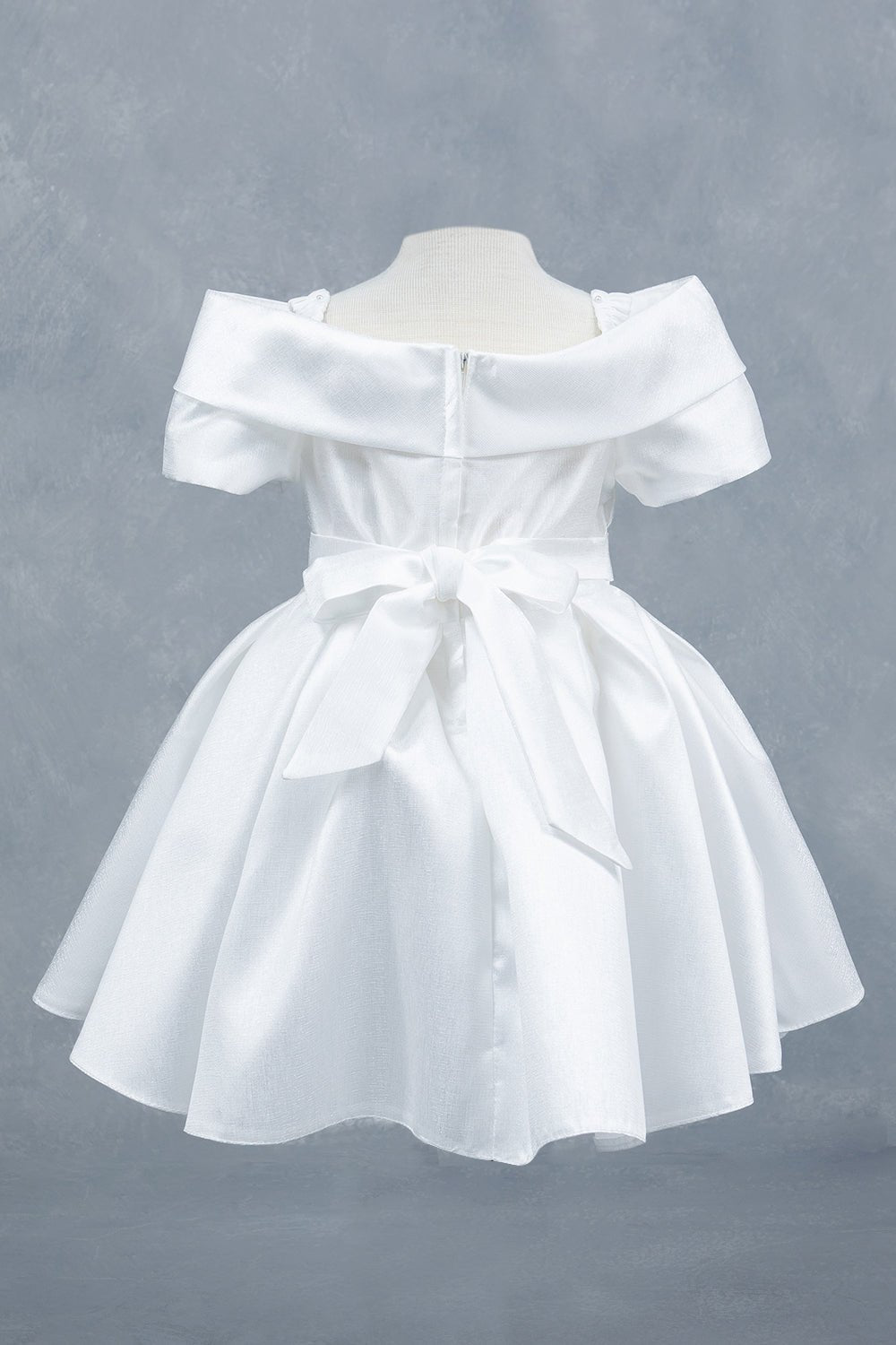 White dress back view highlighting elegant fit and classic silhouette
