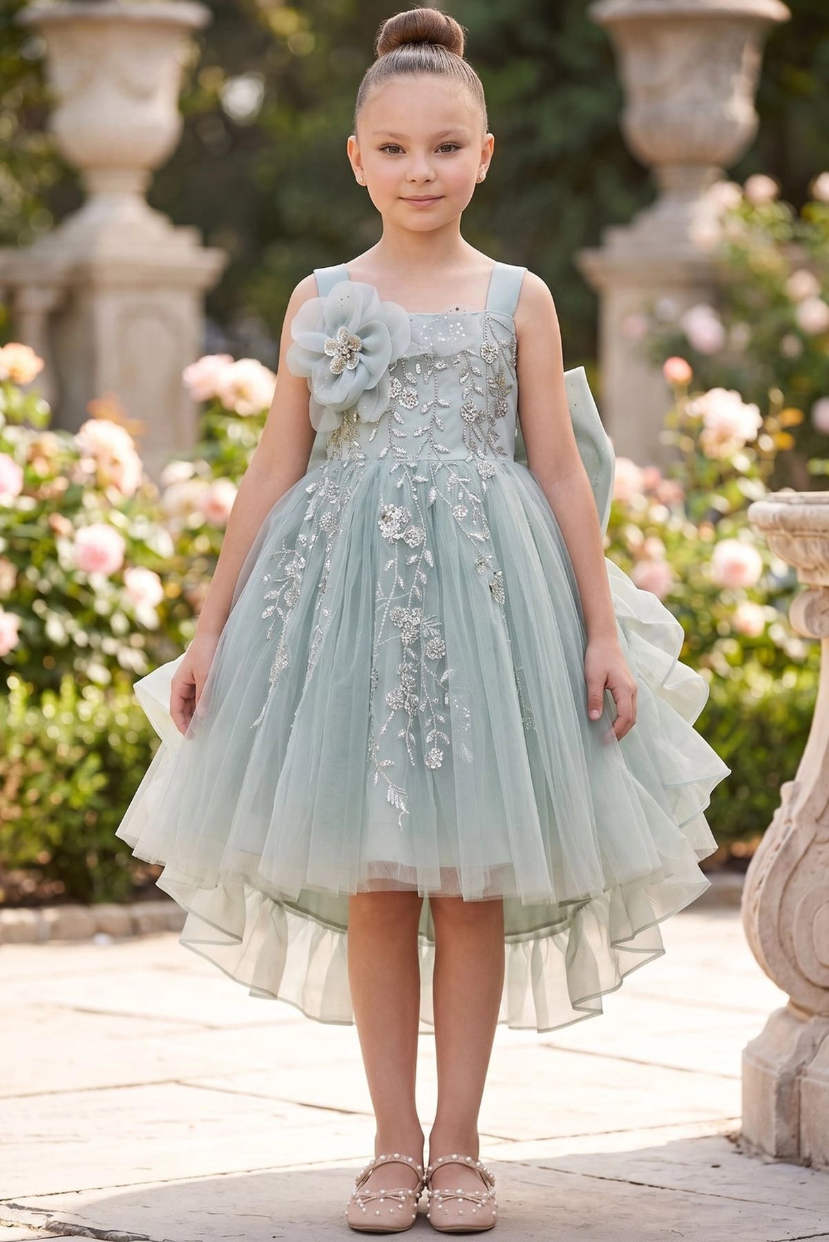 Sage flower girl dress features floral bodice with a layered ruffled hem.