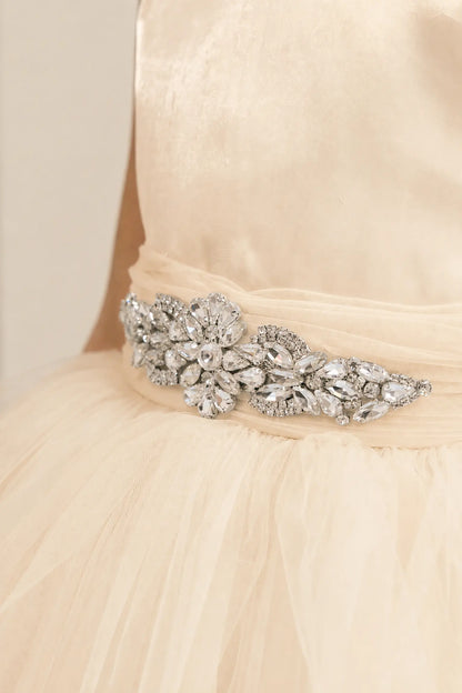 Champagne flower girl dress with rhinestone waistband, satin bodice, and glitter tulle skirt
