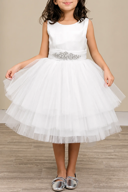 White flower girl dress with satin bodice, rhinestone waistband, and layered glitter tulle skirt