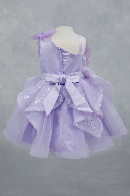 Lilac dress back view highlighting full skirt and elegant silhouette