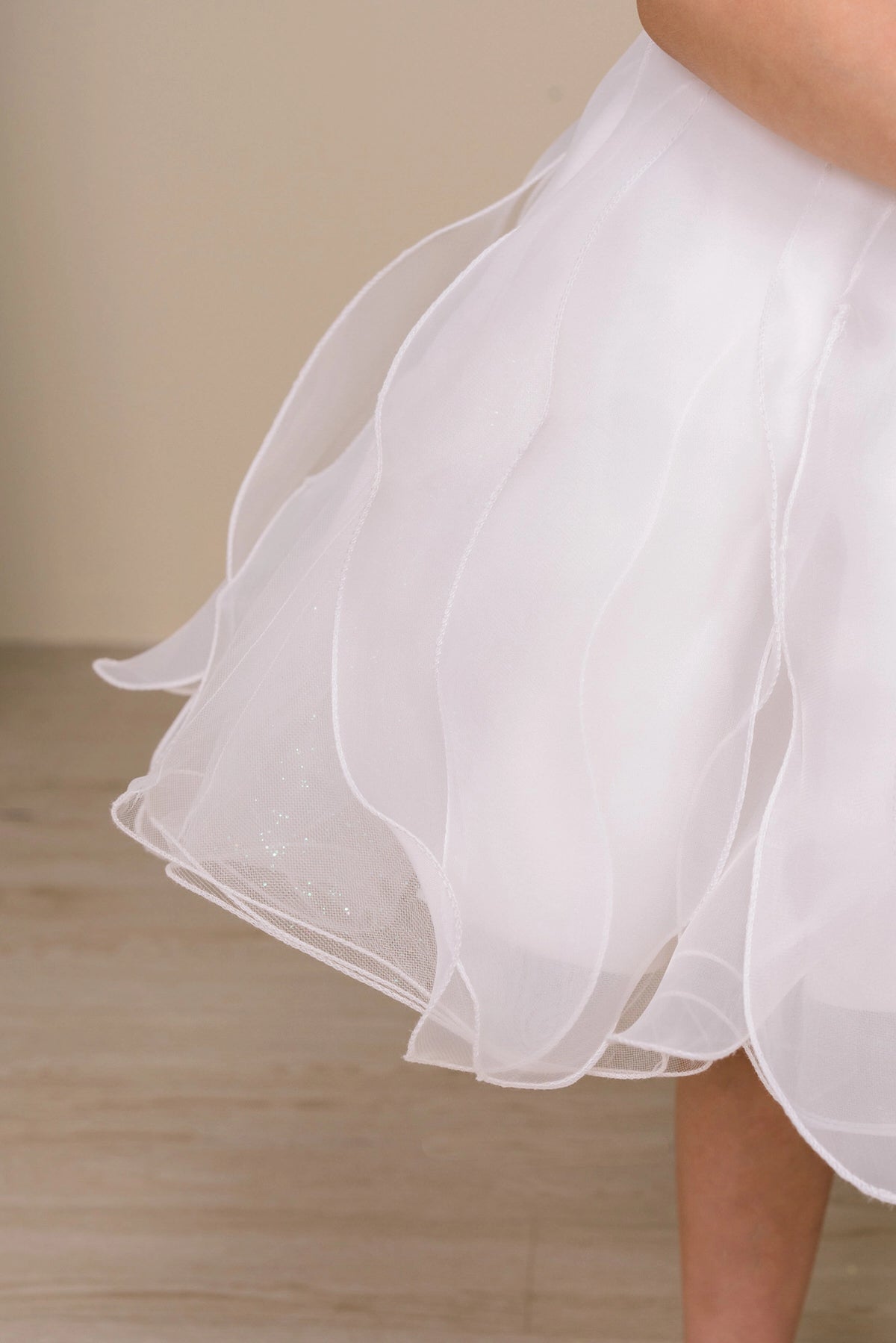 Waved organza edging gives the Burgundy/Ivory kids party dress its airy skirt.