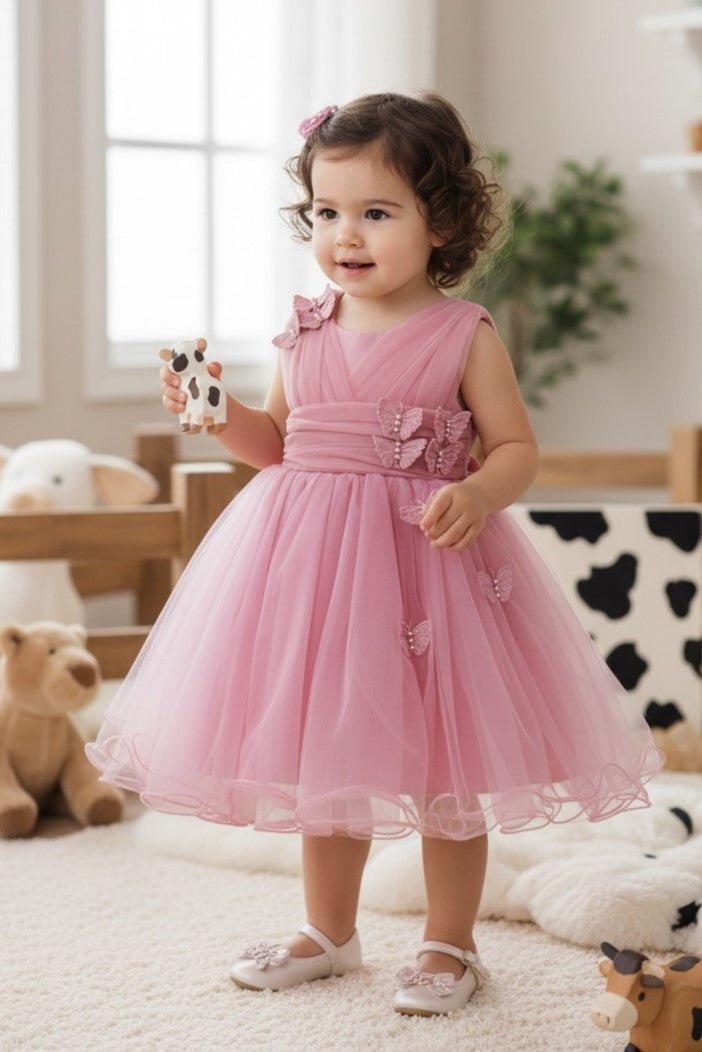 Rose flower girl Dress Front View With Layered Skirt And Oversized Bow Detail.