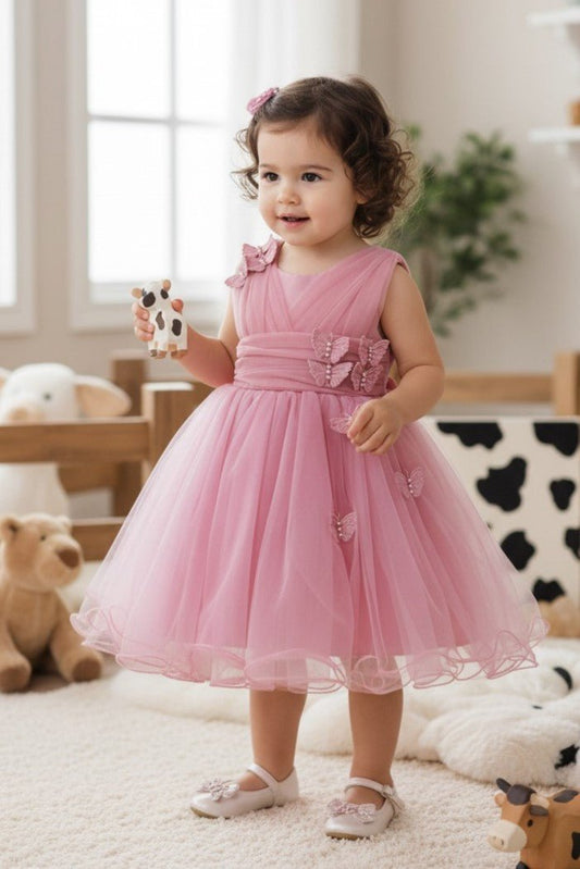 Skirt detail shows rose flower girl Dress With Layered Skirt And Oversized Bow Detail.