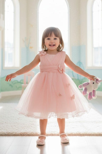 Kid Wearing Peach Flower Girl Dress Front View With Layered Skirt And Oversized Bow Detail