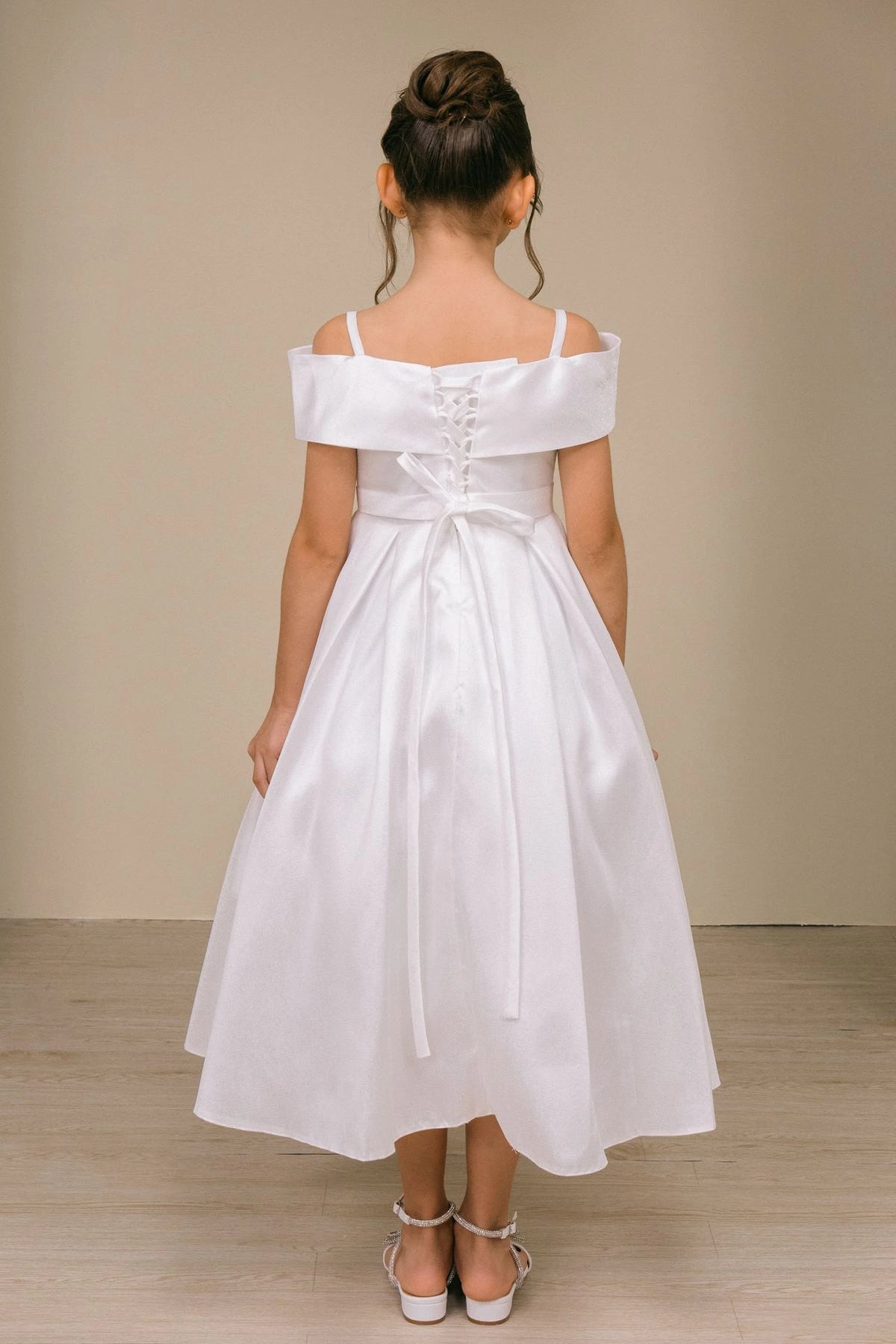 Accented back lacing and a waist sash adds character to this Off-White kids party dress.