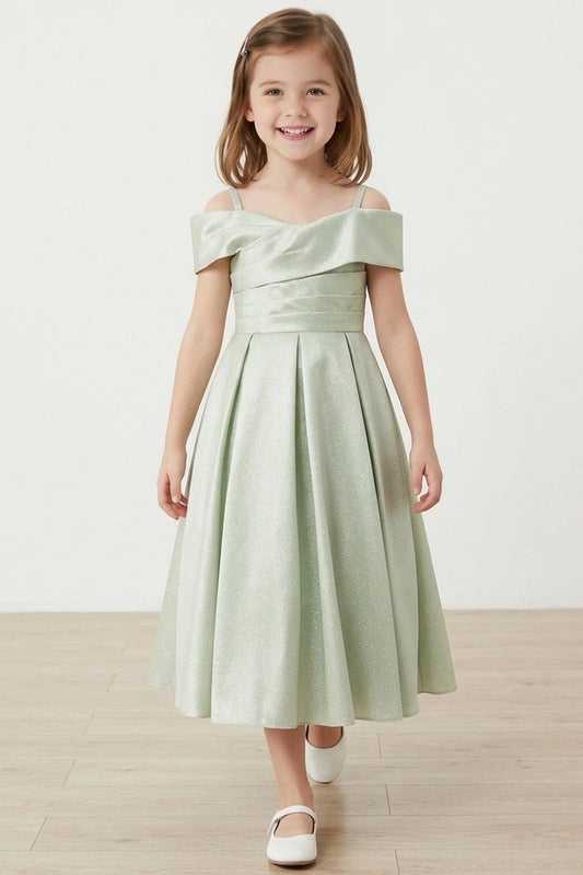 Showcasing with a folded off-shoulder neckline, this Sage kids party dress displays elegant detail.