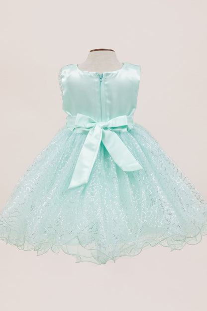 Mint dress back view highlighting full skirt and elegant silhouette