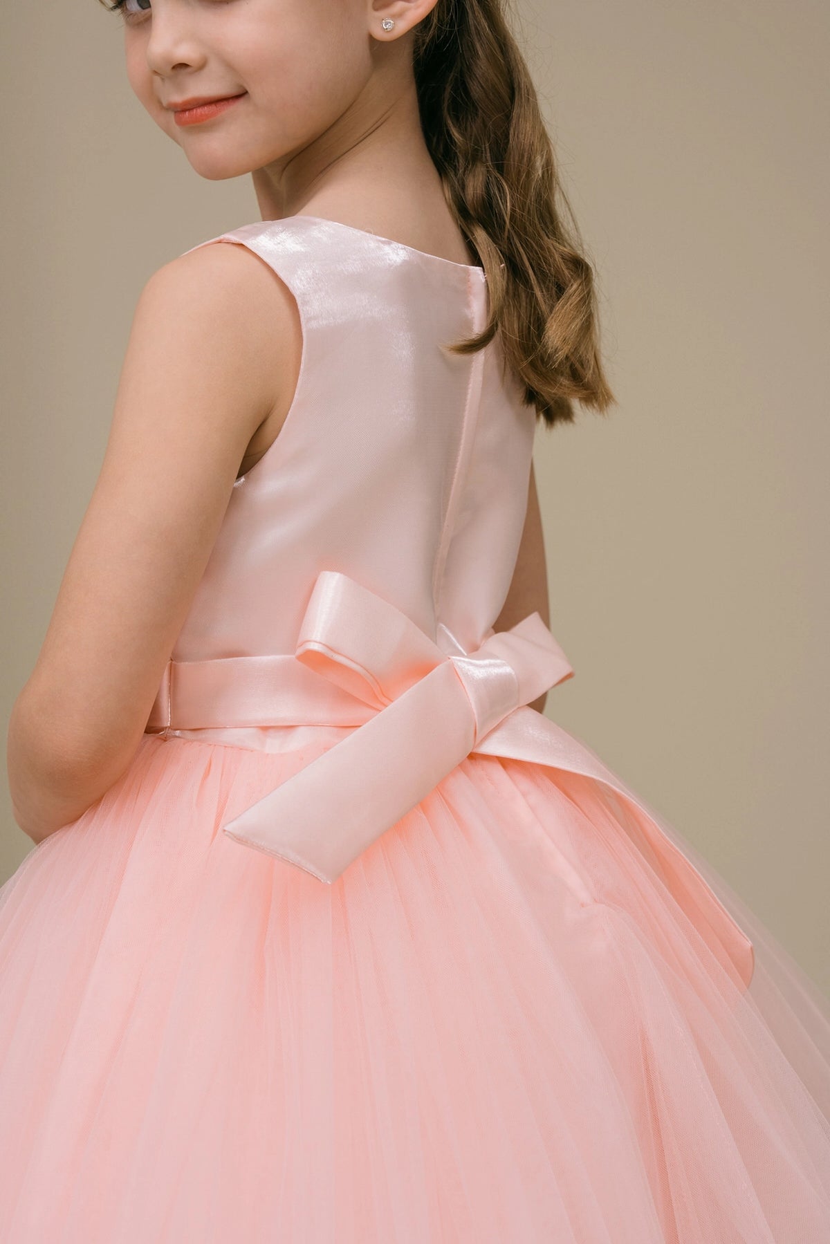 Featuring satin bow and zipper at the back on the Blush flower girl dress.